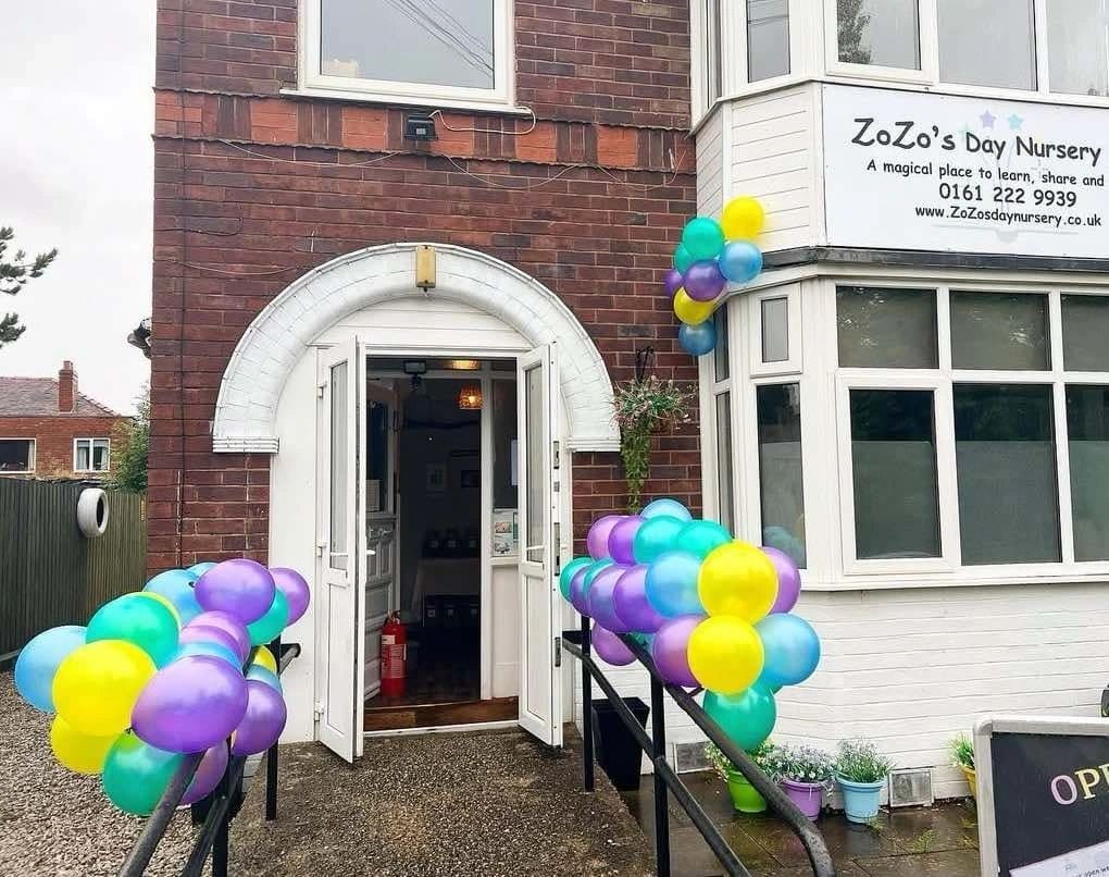 The entrance of ZoZo's Day Nursery on Hollyhedge Road, with colourful balloons